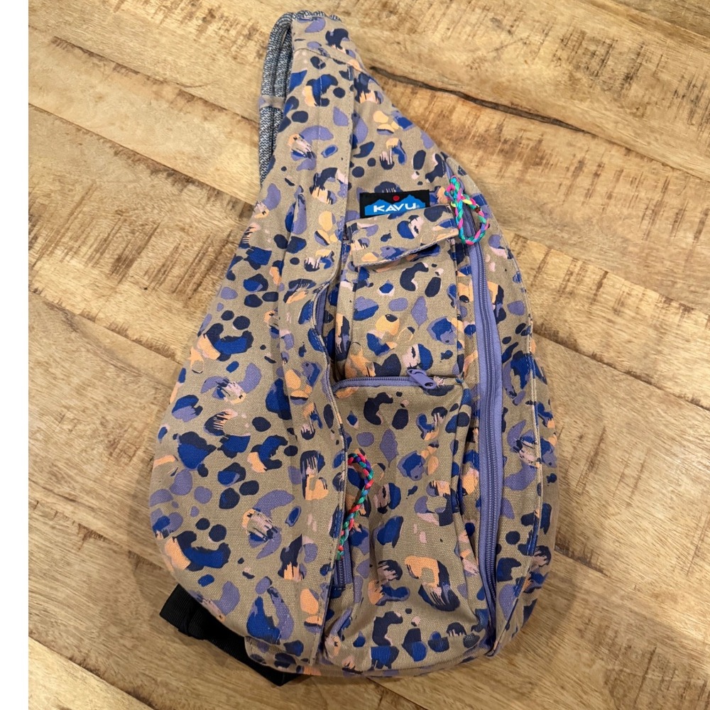 KAVU Rope Bag Sling Backpack Abstract Leopard Print Tan Blue Purple Canvas